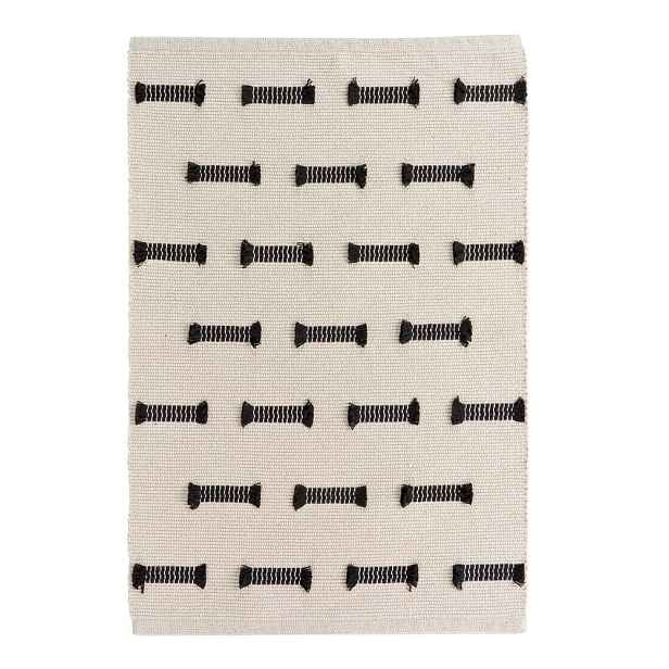Krémový pratelný koberec 50x80 cm Juline – douceur d'intérieur