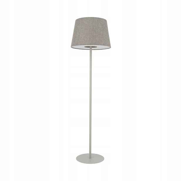 Béžová podlahová lampa Tutoia je moderní vedle křesla v obývacím pokoji Nowodvorski