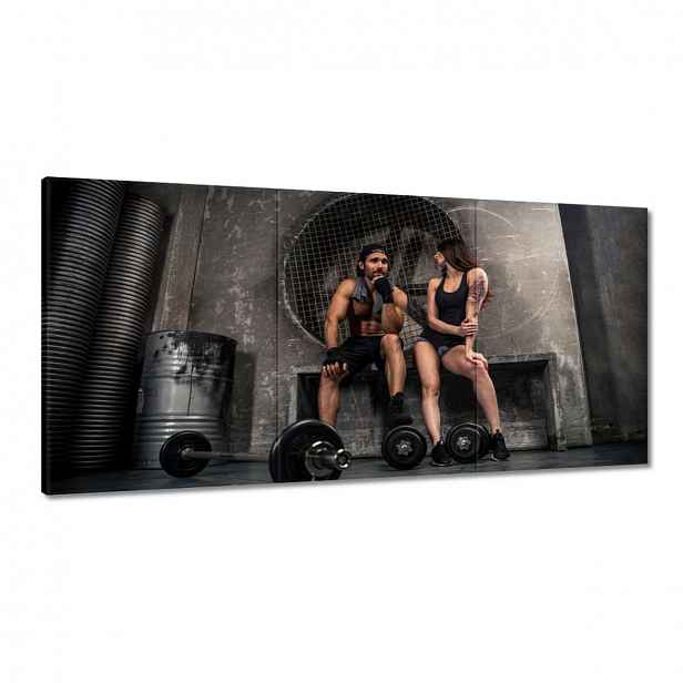 Obrazy 120x60 Zamilovaný pár v posilovně
