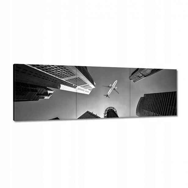 Obrazy 120x40 Letadlo nad městem