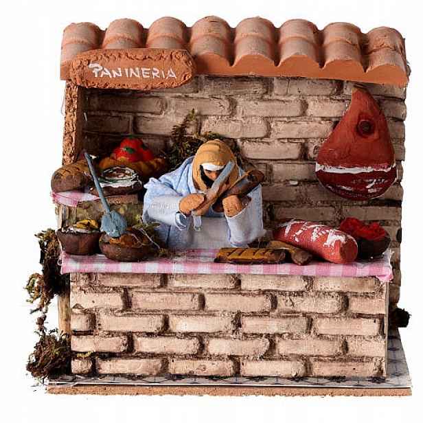 Pohyblivá figurka do Betléma 'Prodejce uzenin', na 220V pro figurky o výšce 10 cm