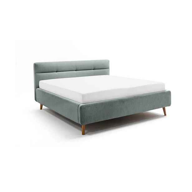 Světle modrá čalouněná dvoulůžková postel s úložným prostorem s roštem 160x200 cm Lotte – Meise Möbel